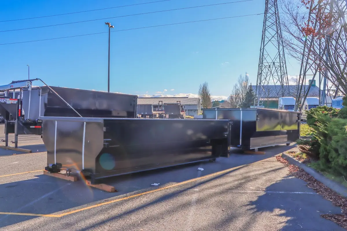 Roll-off dumpster ready for waste disposal at job site for Concrete Dumpster Rental in Dunkirk